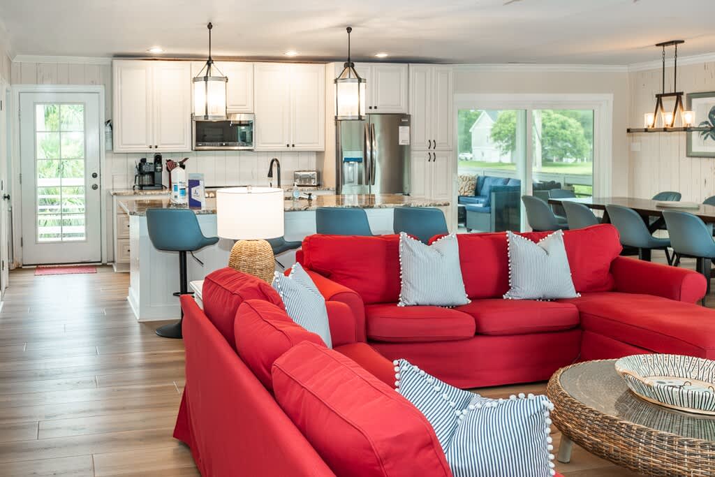 Open Concept Living Room with Access to Front Porch and Screened Porch
