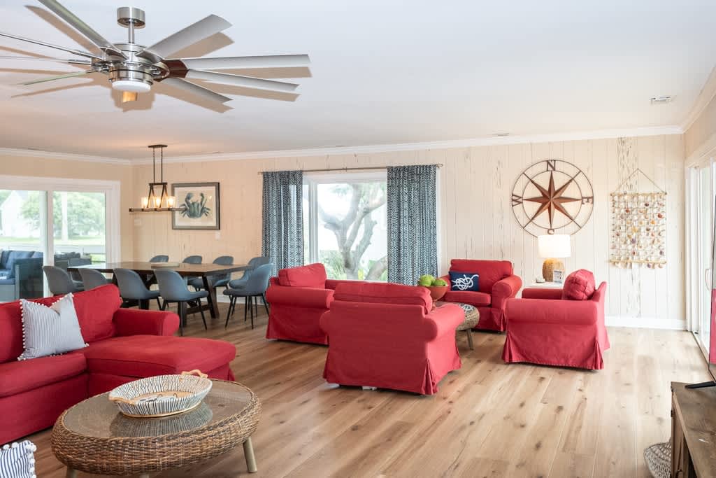 Open Concept Living Room with Access to Front Porch and Screened Porch