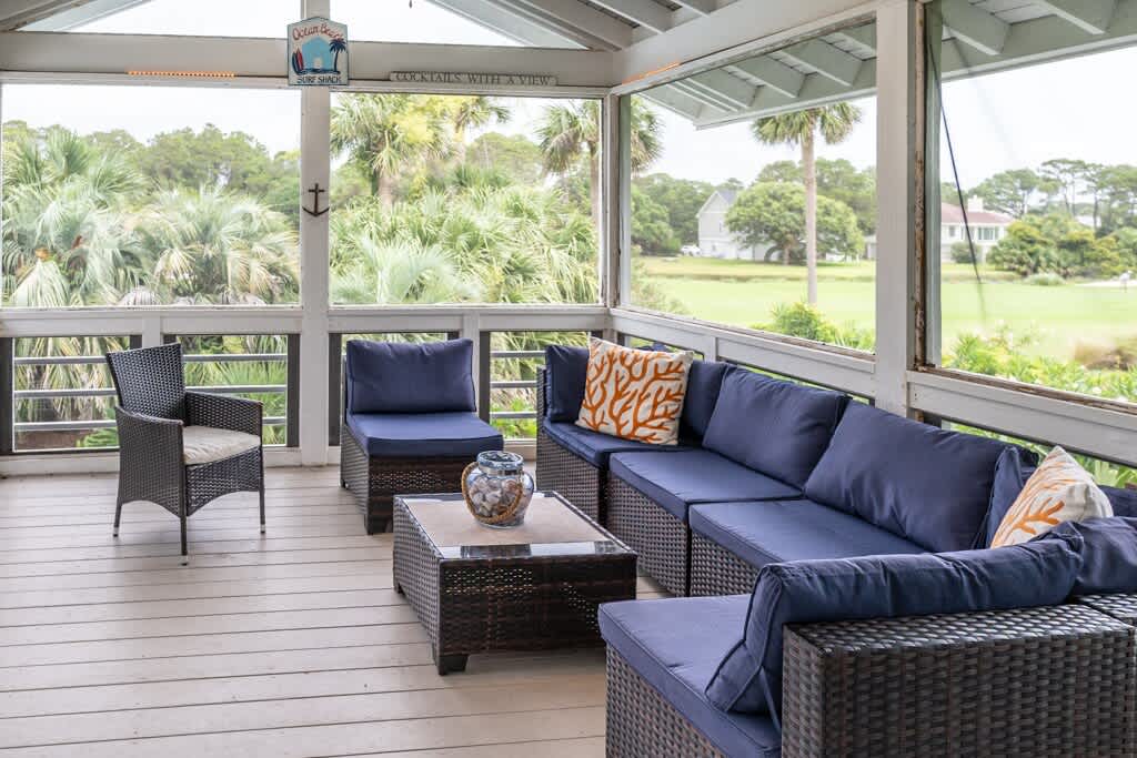 Screened Porch with Access to Living Room and Staircase to Pool