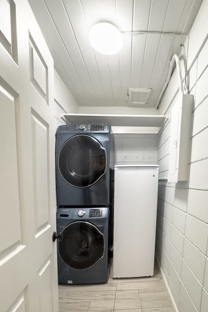 Laundry Room with Extra Refrigerator for Convenience