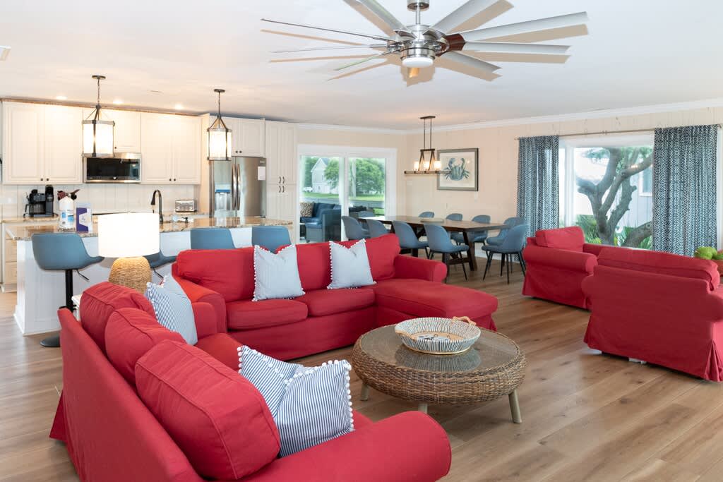 Open Concept Living Room with Access to Front Porch and Screened Porch