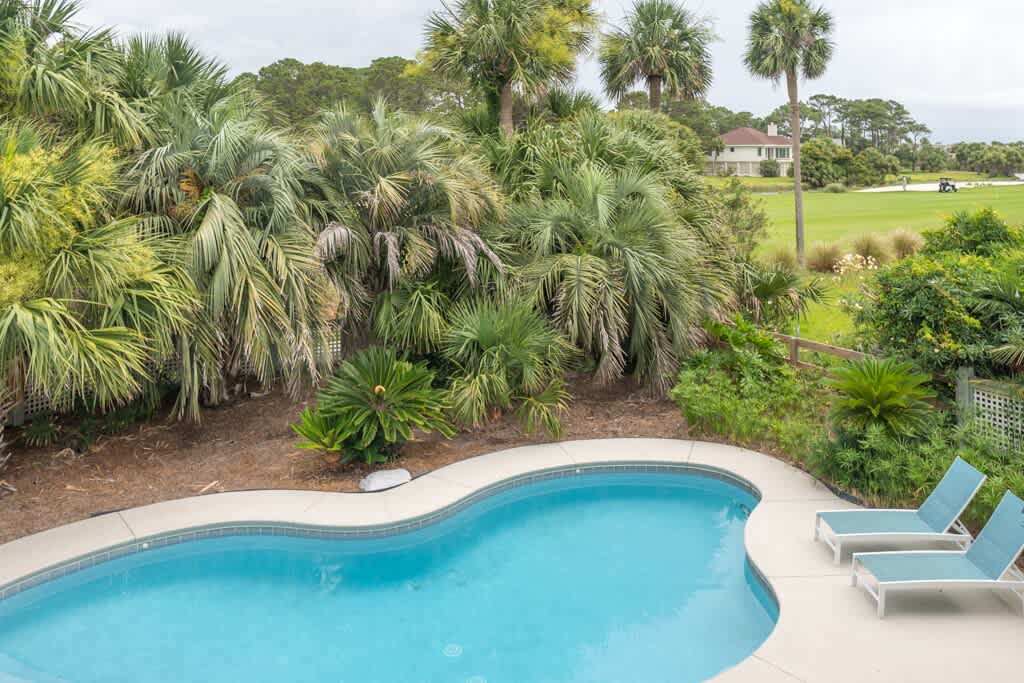 Beautiful Pool and Backyard with Dining/Lounging and Grill Areas on Golf Course