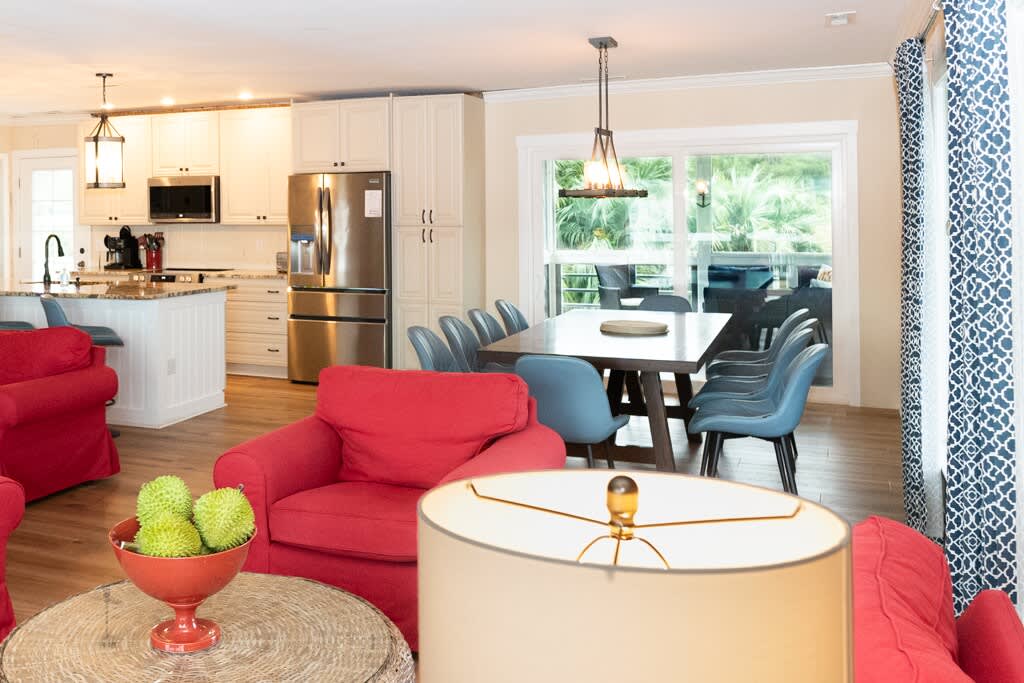 Open Concept Living Room with Access to Front Porch and Screened Porch