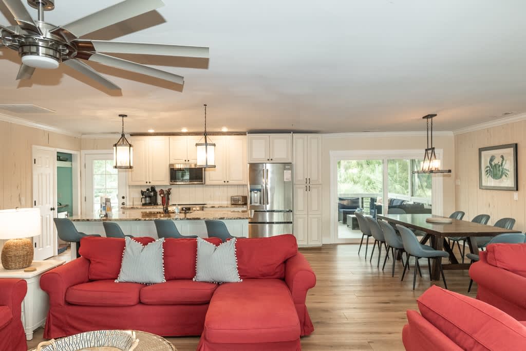 Open Concept Living Room with Access to Front Porch and Screened Porch