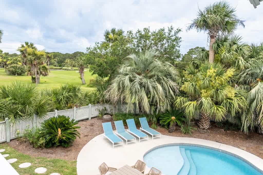 Beautiful Pool and Backyard with Dining/Lounging and Grill Areas on Golf Course