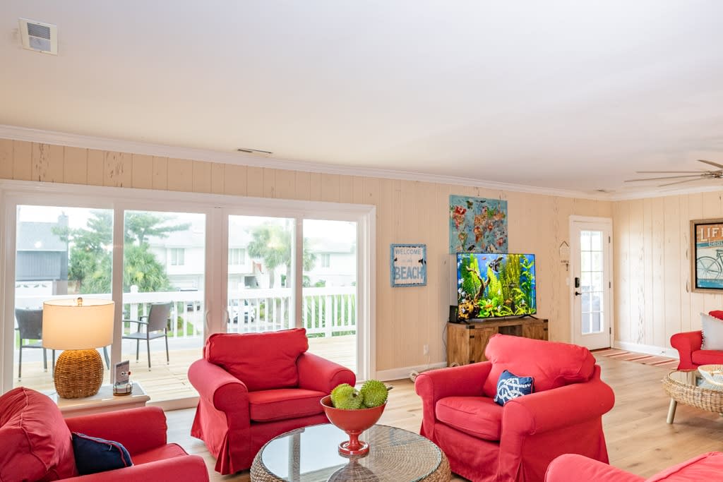 Open Concept Living Room with Access to Front Porch and Screened Porch