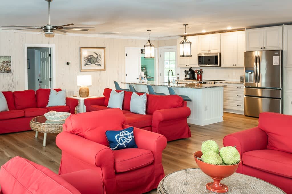 Open Concept Living Room with Access to Front Porch and Screened Porch