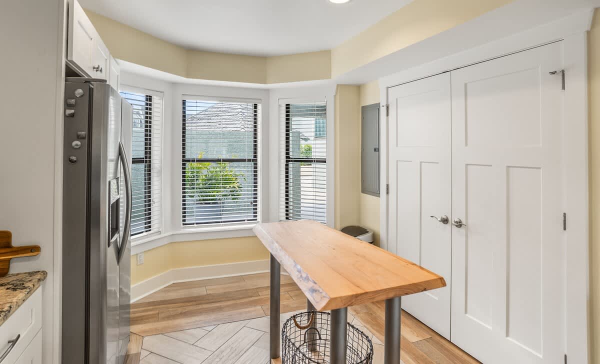 Well equipped kitchen with island and laundry room