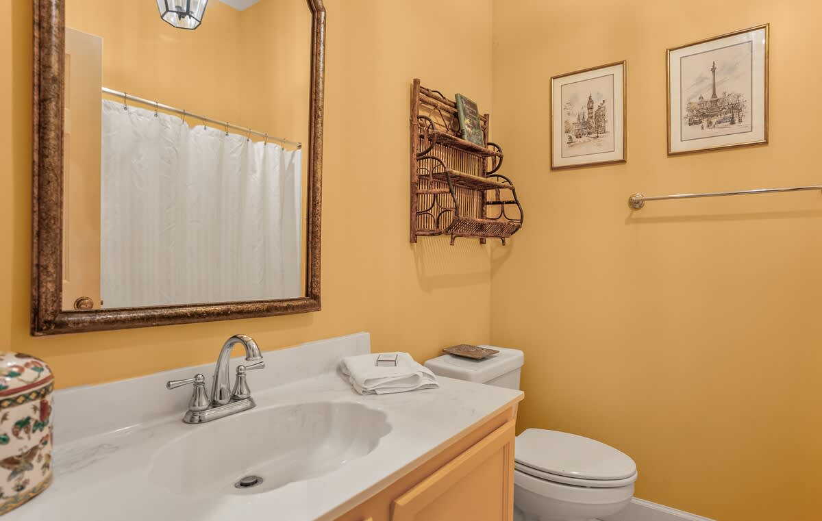 Guest Bedroom with a Shared Full Hall Bathroom 