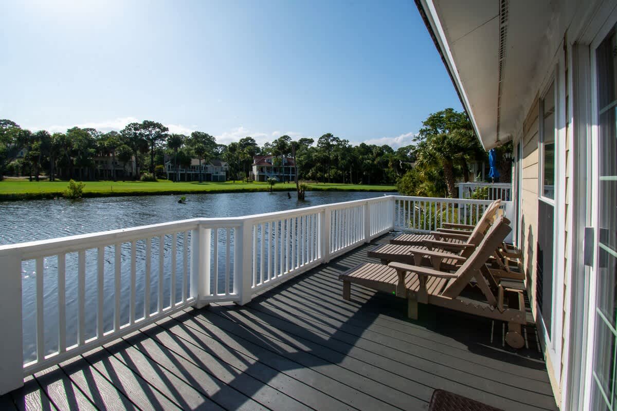 Lovely backyard deck overlooking water and Ocean Point golf course