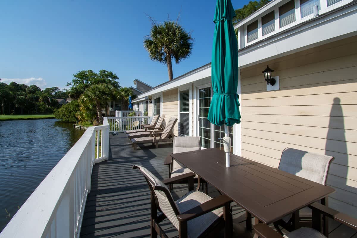 Lovely backyard deck overlooking water and Ocean Point golf course
