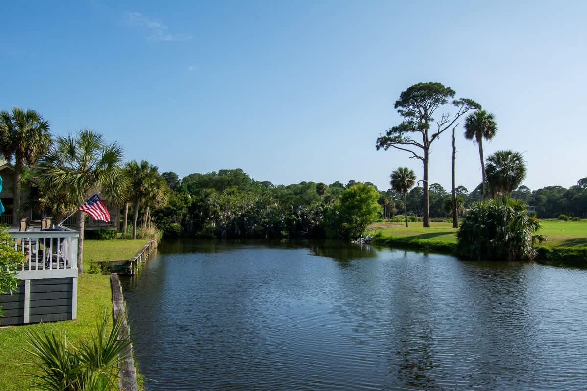 Lovely backyard deck overlooking water and Ocean Point golf course