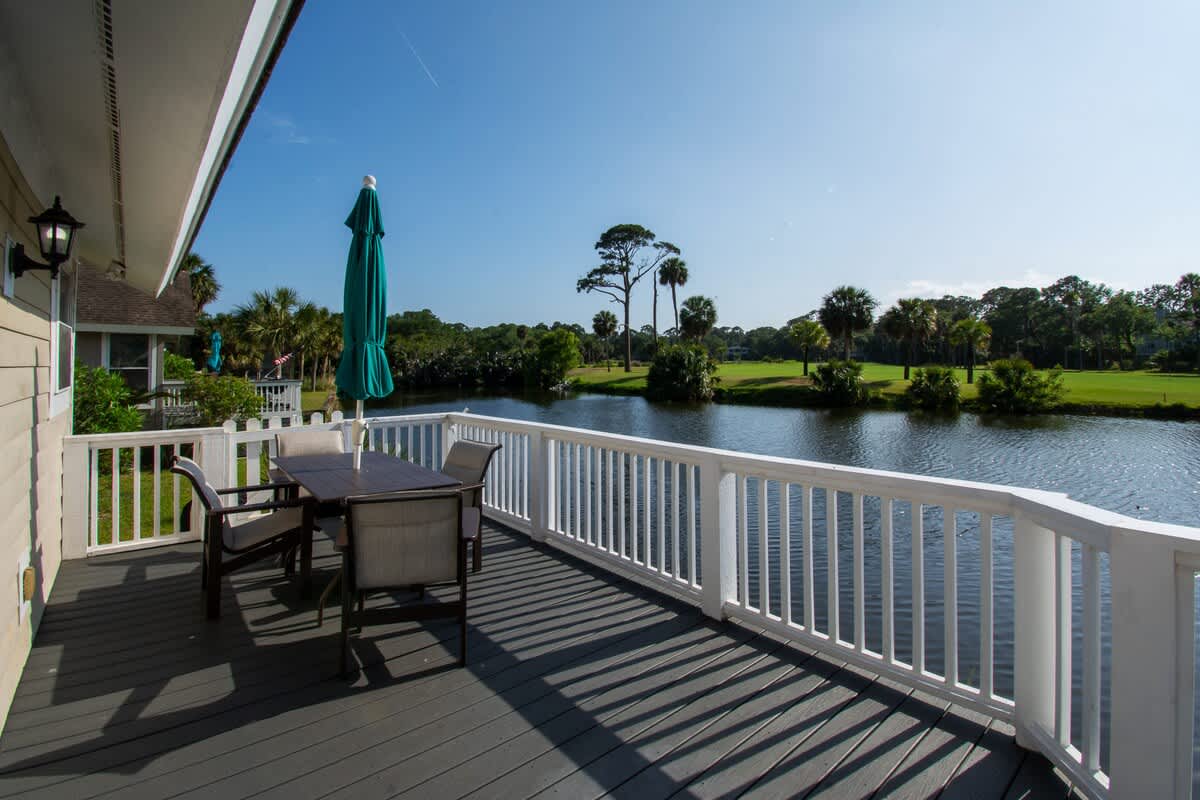 Lovely backyard deck overlooking water and Ocean Point golf course