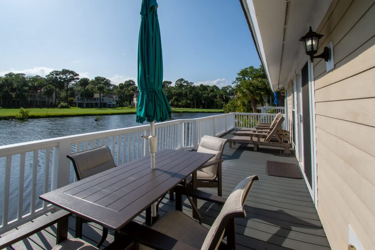 Lovely backyard deck overlooking water and Ocean Point golf course