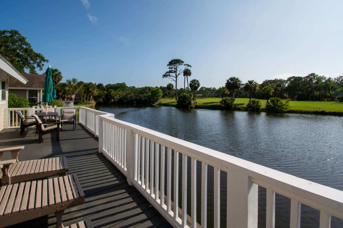 Lovely backyard deck overlooking water and Ocean Point golf course