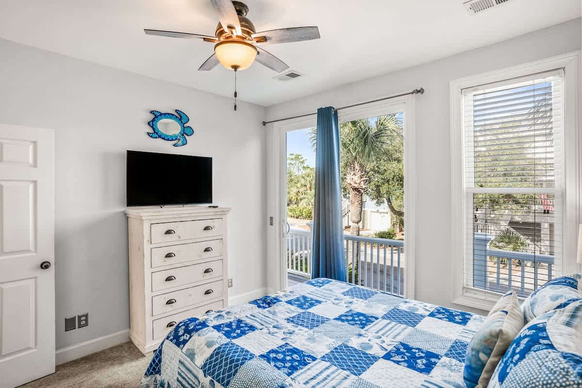 Queen Bed on Main Level with Balcony. Full Bath in the Hall