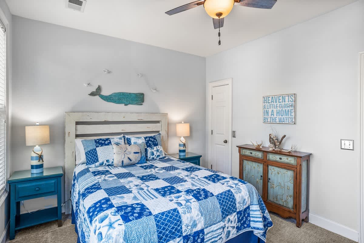 Queen Bed on Main Level with Balcony. Full Bath in the Hall