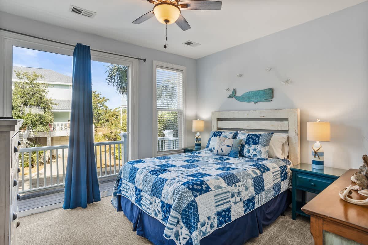 Queen Bed on Main Level with Balcony. Full Bath in the Hall