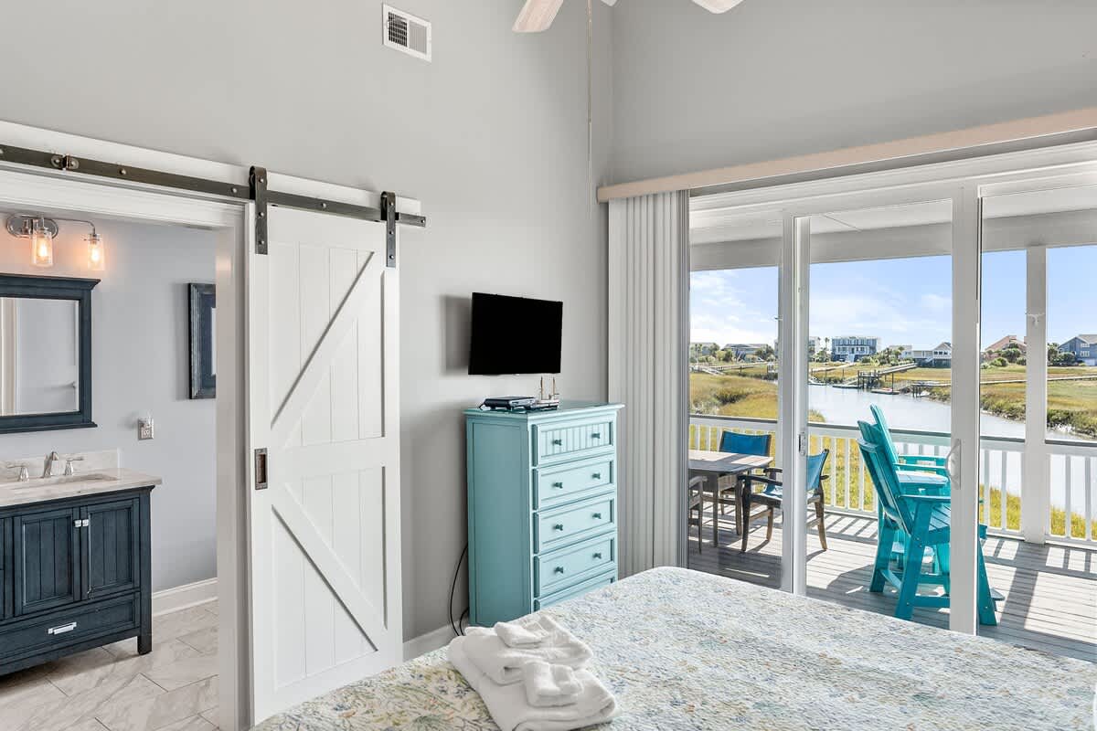 Primary Bedroom with King Bed, Private Balcony, and Private En-Suite 