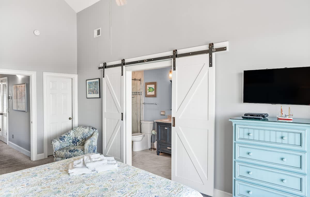 Primary Bedroom with King Bed, Private Balcony, and Private En-Suite 