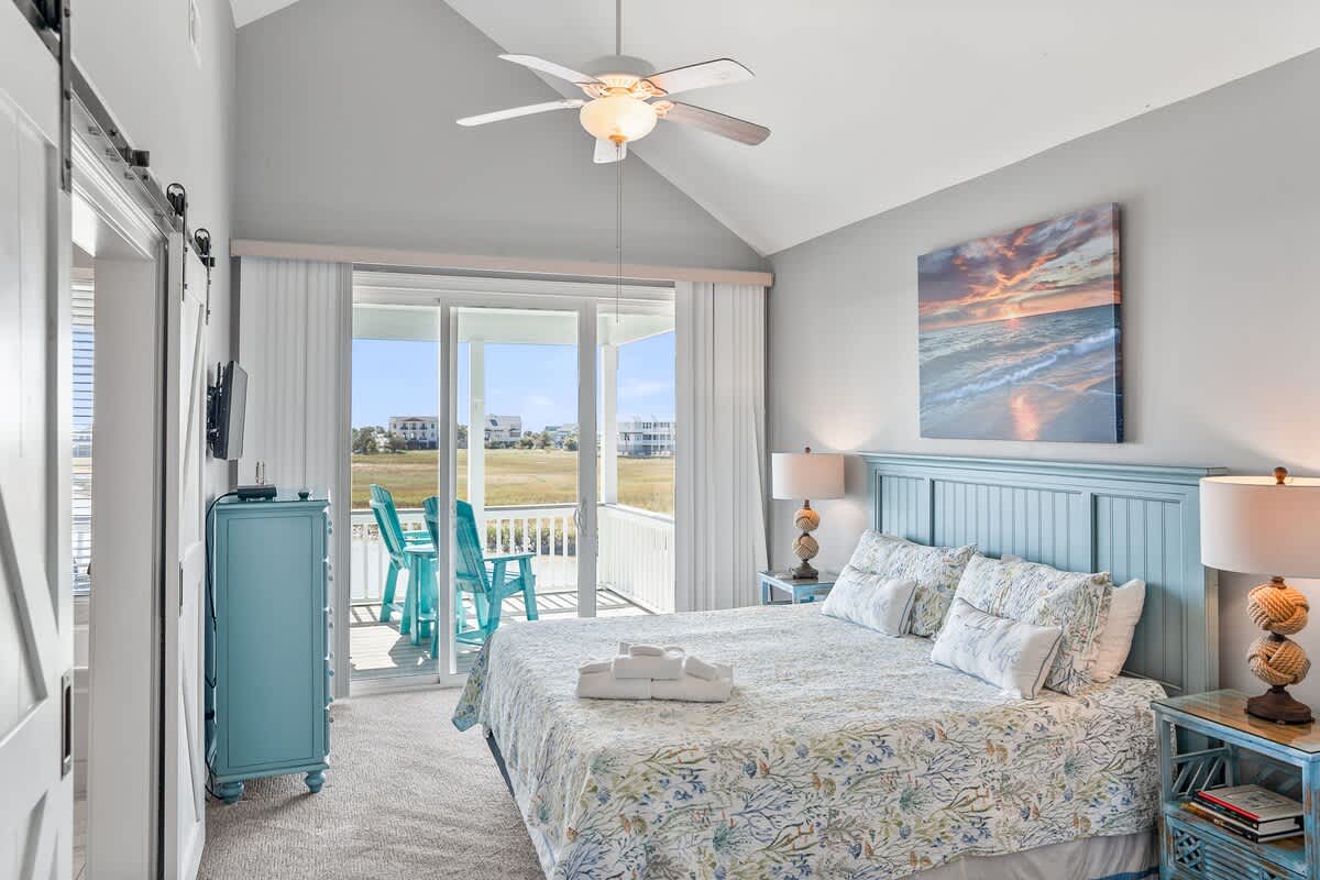 Primary Bedroom with King Bed, Private Balcony, and Private En-Suite 