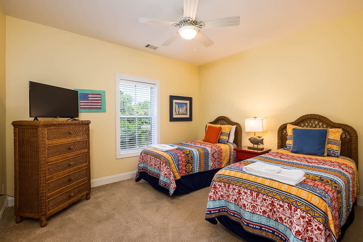 Guest Bedroom with two Twin Beds. Shared Hallway Bathroom 