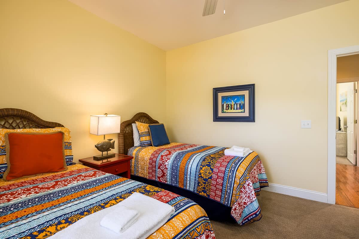 Guest Bedroom with two Twin Beds. Shared Hallway Bathroom 