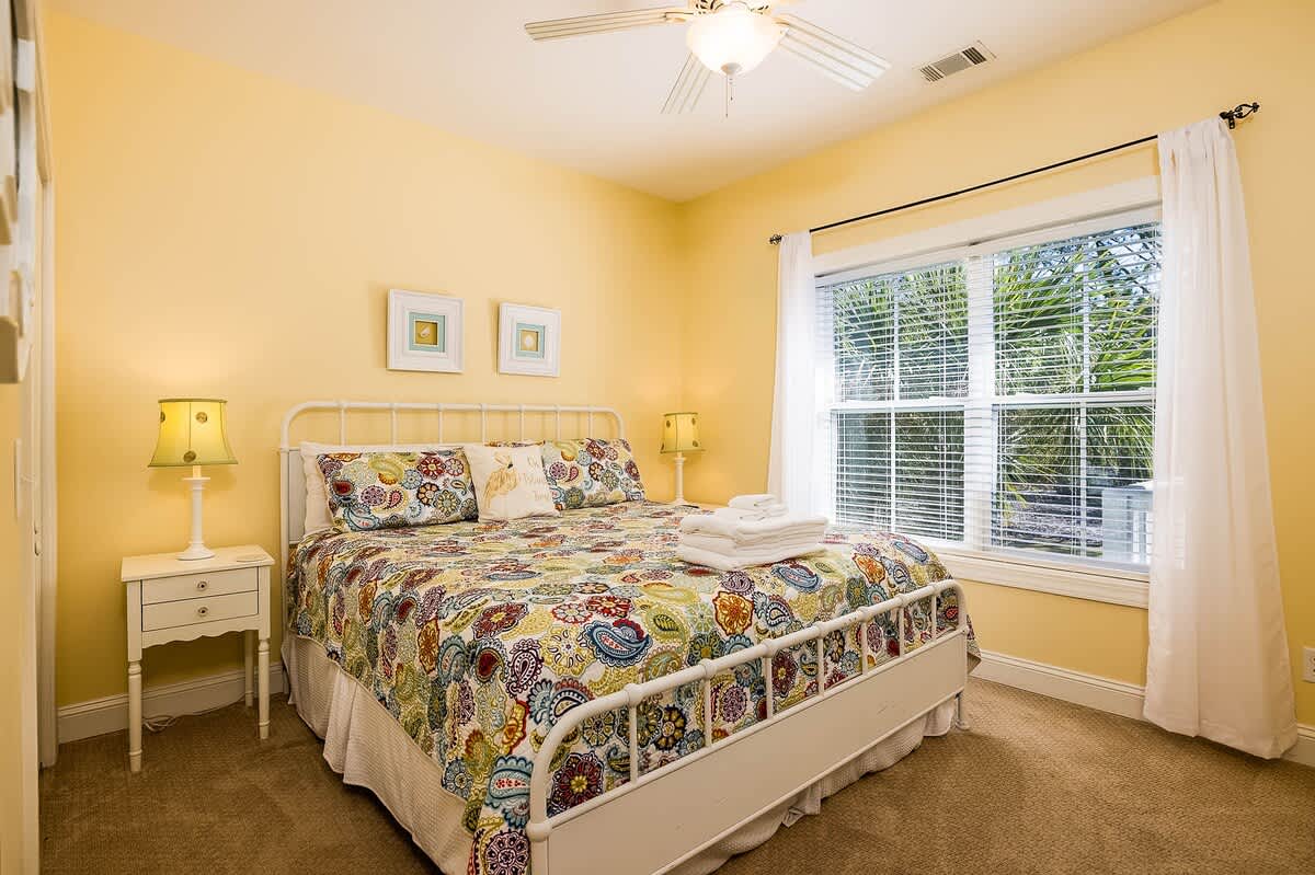 Guest Bedroom with a King Bed. Shared Hallway Bathroom 