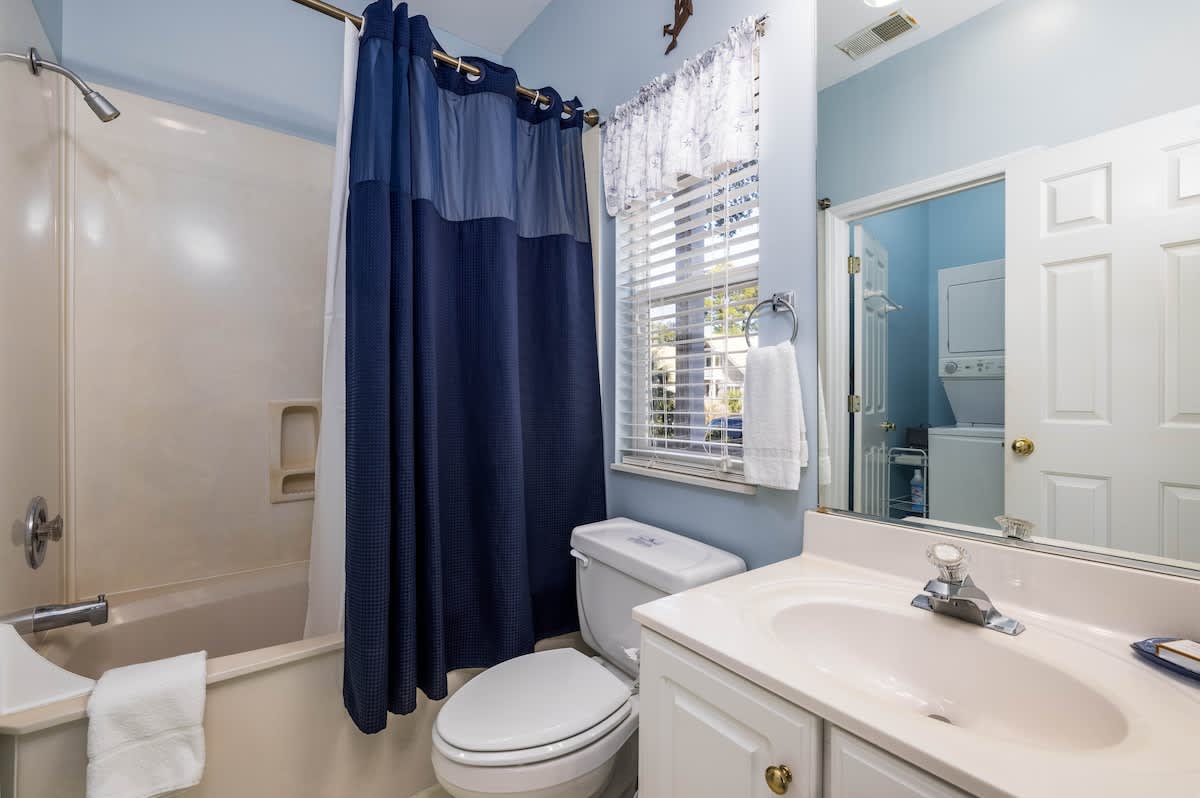 Guest En Suite Bathroom with Laundry Area