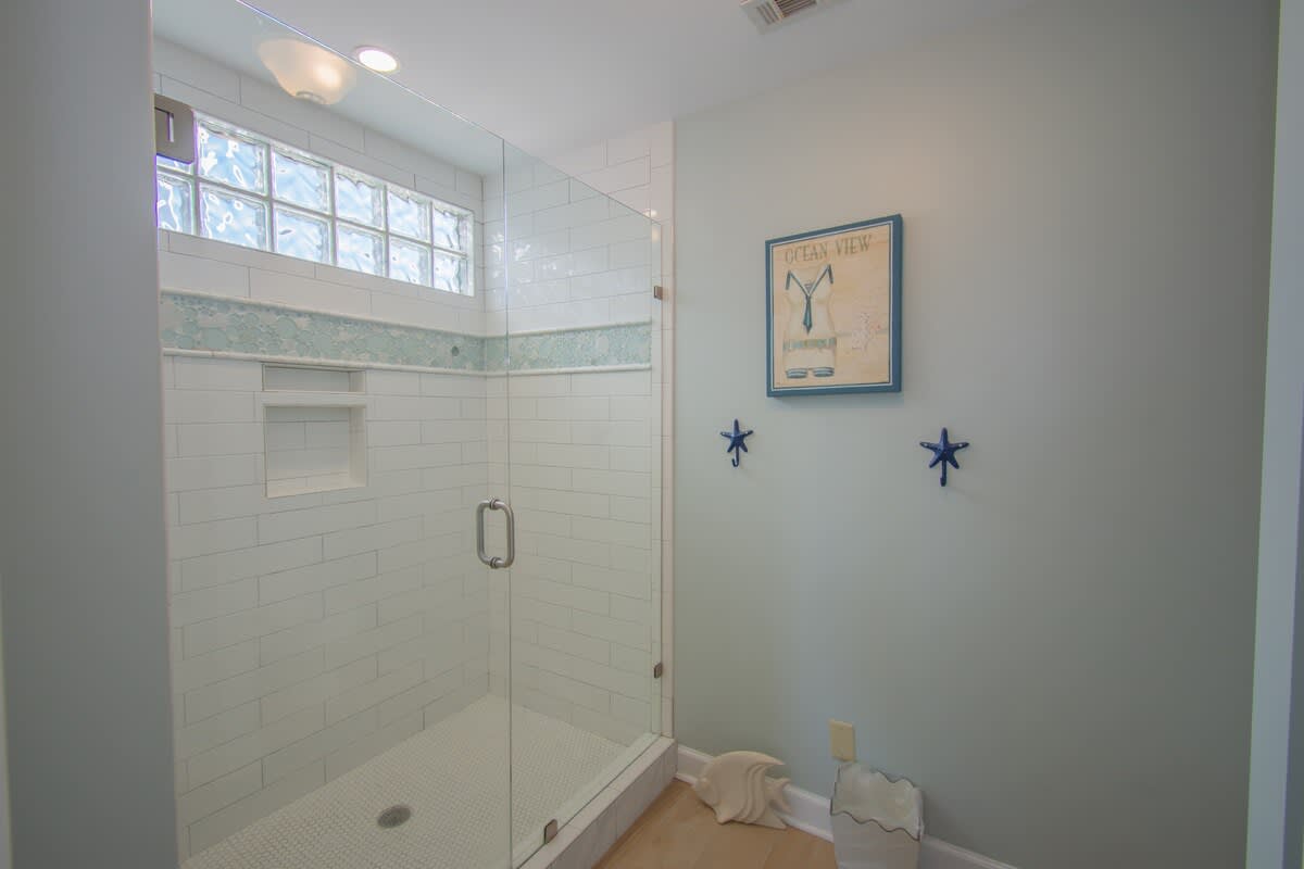 Primary bedroom with en suite bathroom and spectacular balcony views