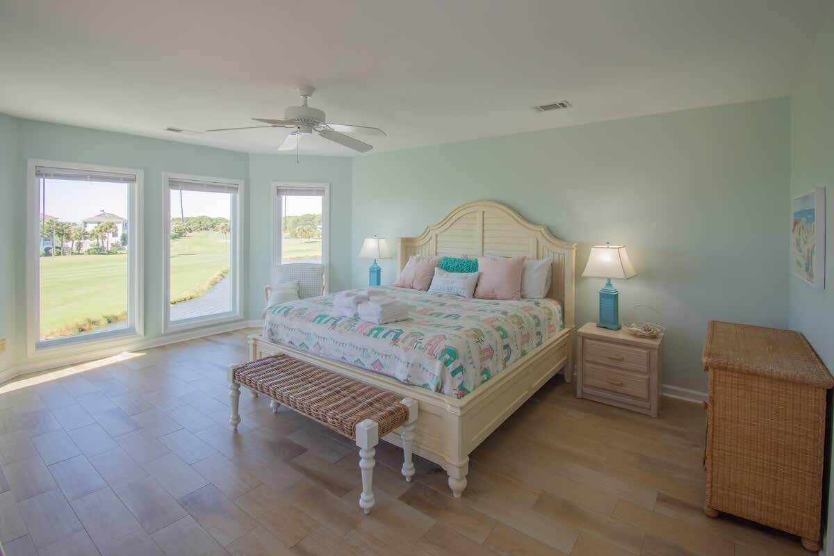 Primary bedroom with en suite bathroom and spectacular balcony views