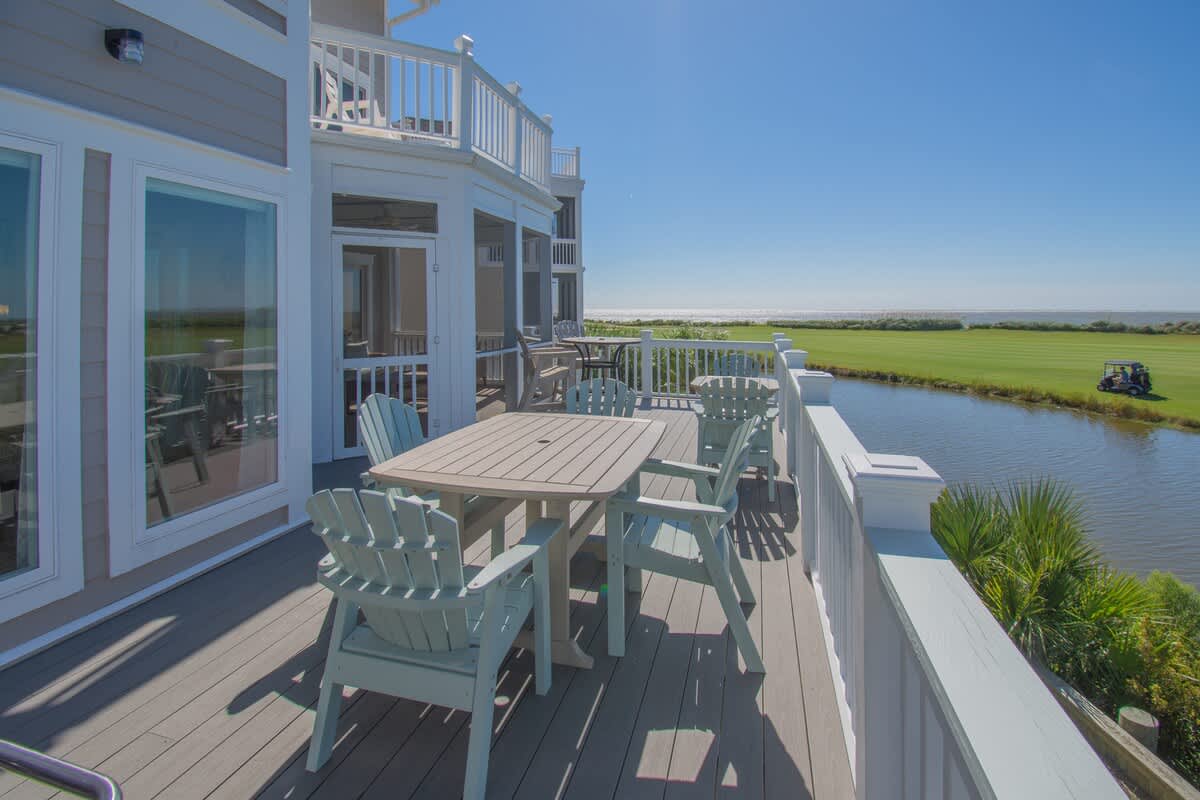 Stunning golf course and ocean views from the back porch