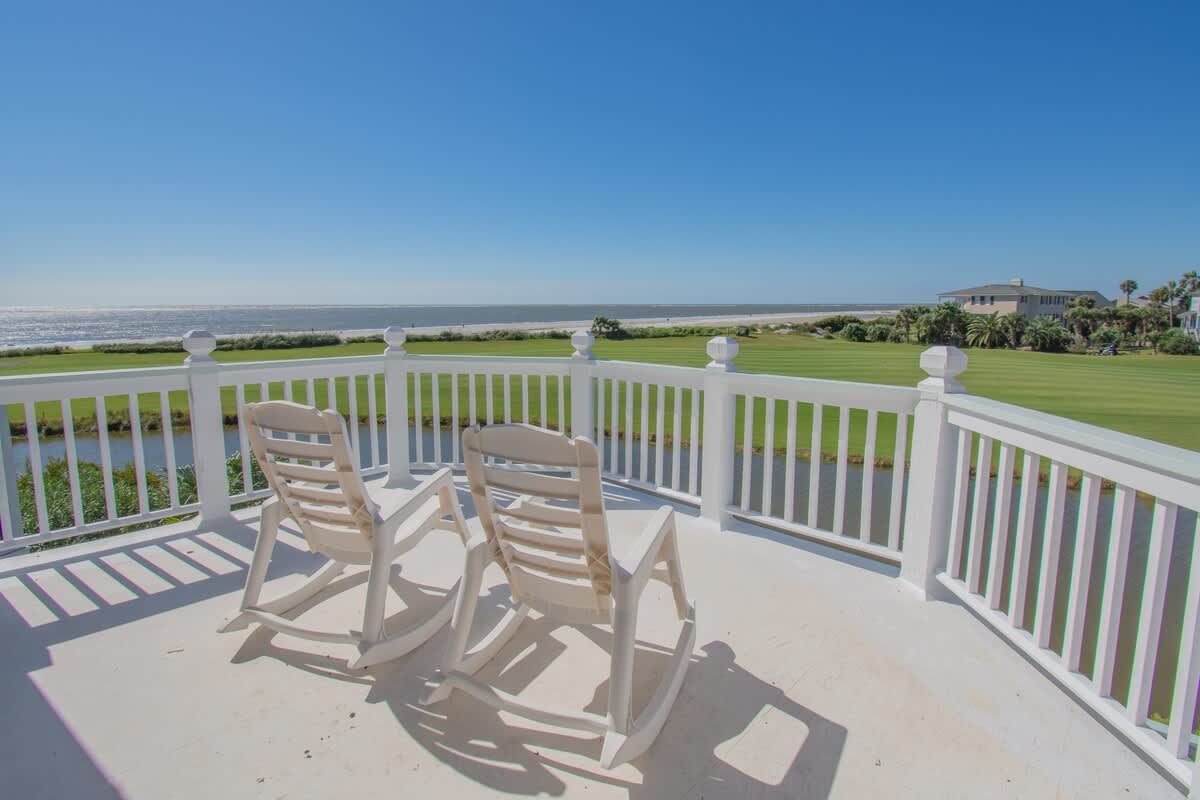 Stunning golf course and ocean views from the back porch