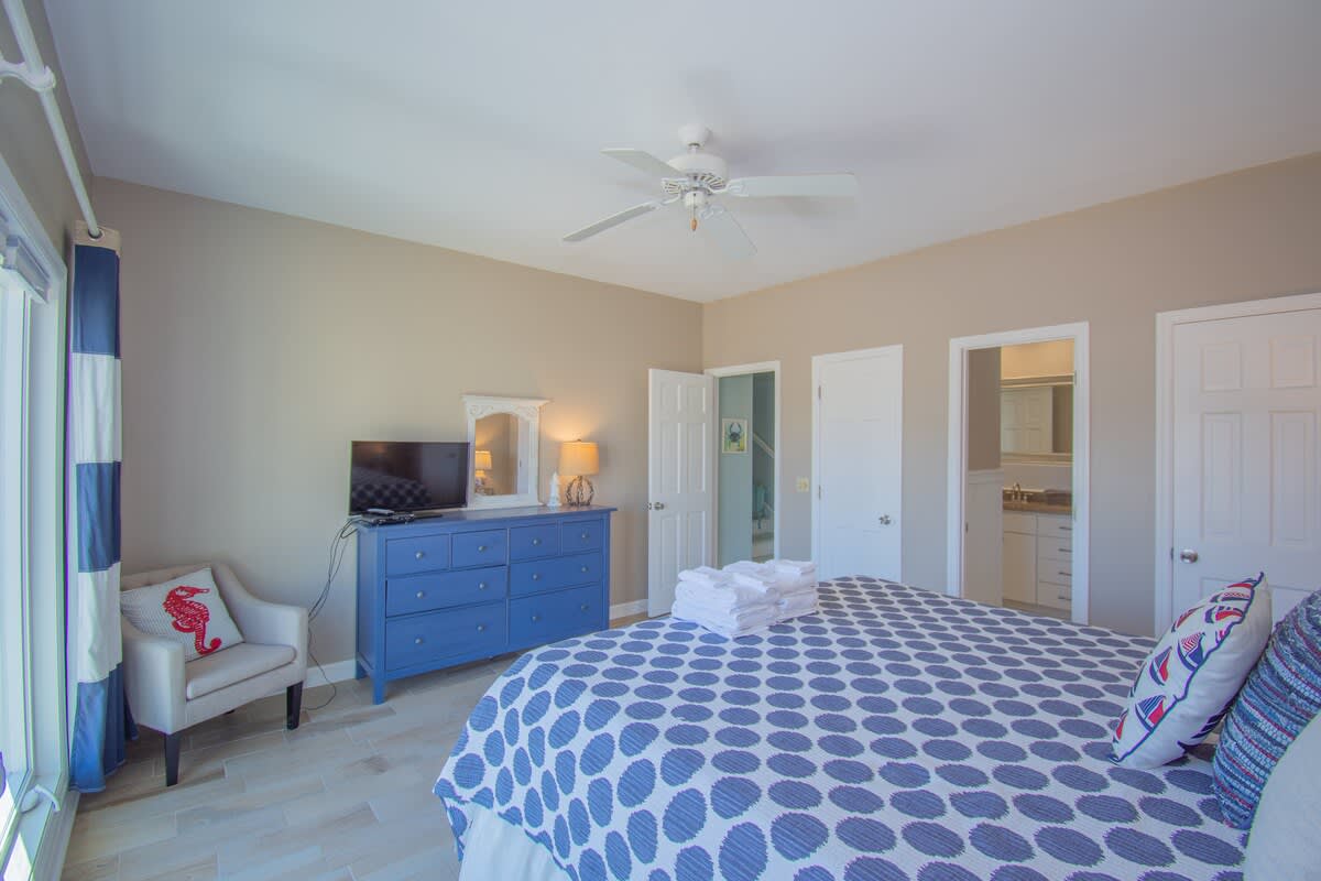 First floor guest bedroom with Jack and Jill bathroom that is shared with the hallway