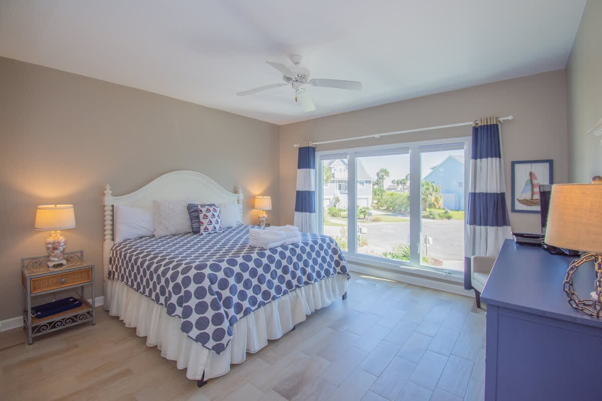 First floor guest bedroom with Jack and Jill bathroom that is shared with the hallway