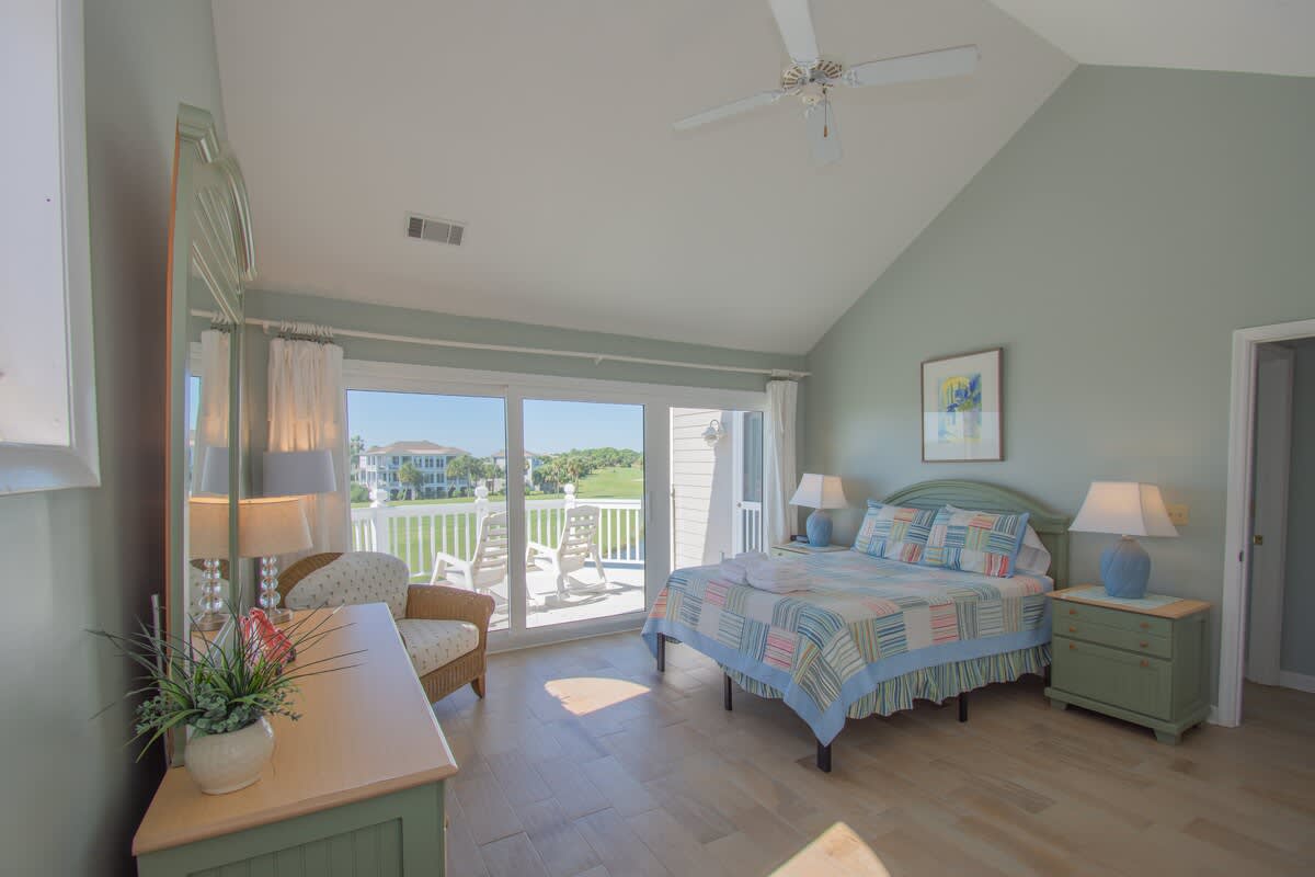 Second floor guest bedroom with stunning balcony views