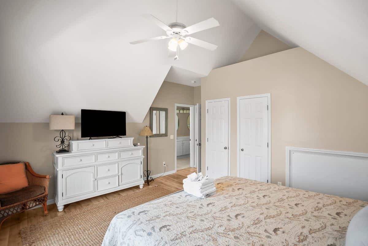 Primary Bedroom with Private Balcony and Access to Jack and Jill Bathroom 