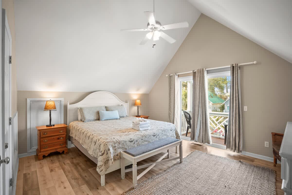 Primary Bedroom with Private Balcony and Access to Jack and Jill Bathroom 