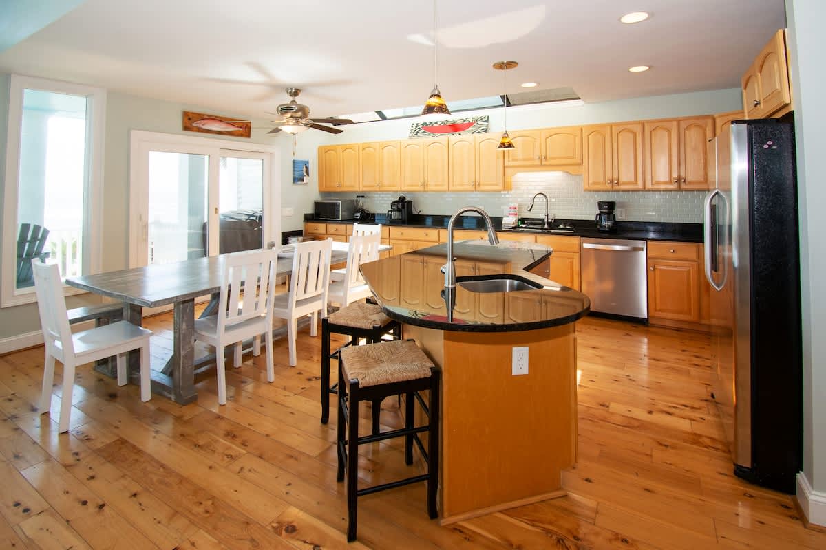 Open concept kitchen, living room and dining room