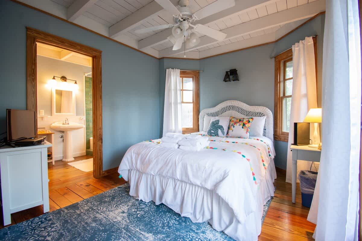 1st Level Guest Bedroom 1 With Queen Bed and Full En Suite Bathroom