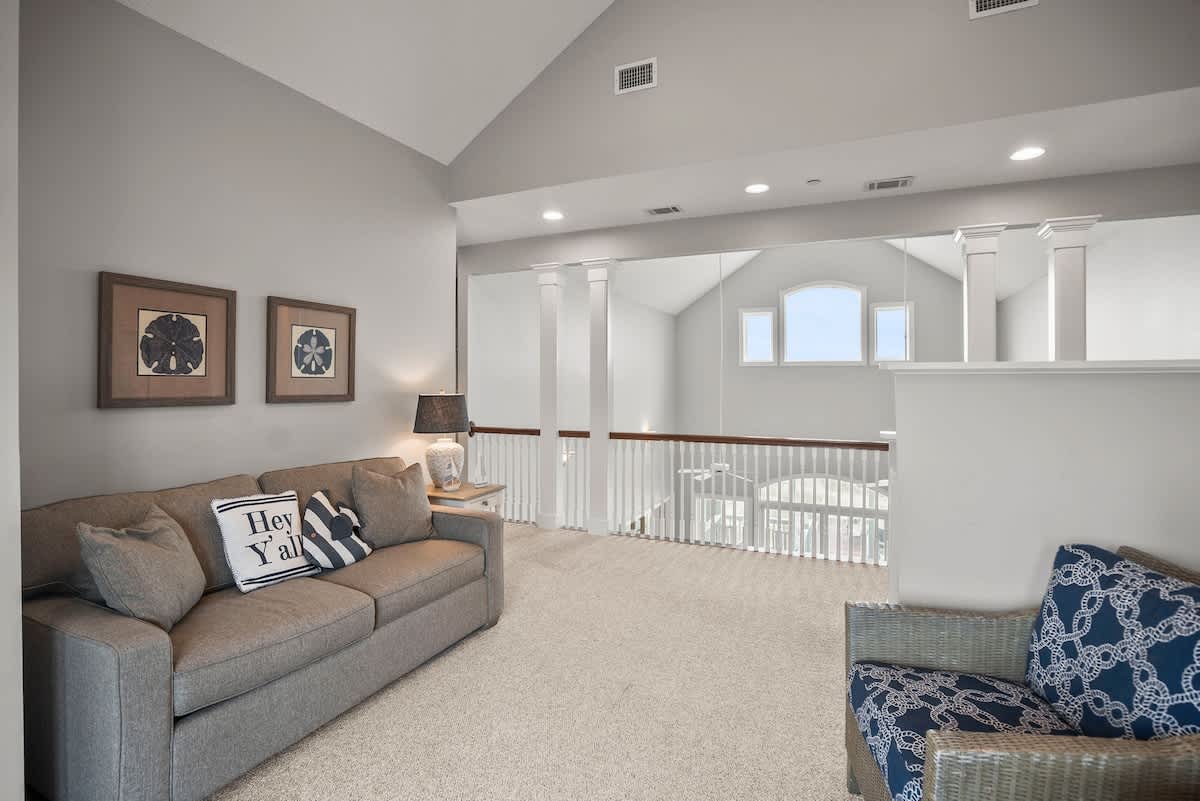2nd Level Seating Area/Pull Out Couch with Access to Front Balcony