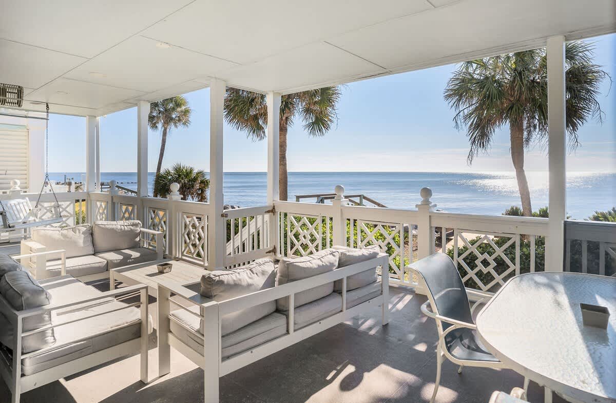 Ocean Front Balcony with Seating, Grill and Access to the Living Room/Kitchen, Primary 1st Level Bedroom