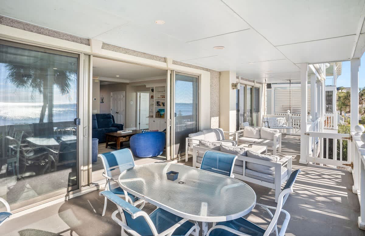 Ocean Front Balcony with Seating, Grill and Access to the Living Room/Kitchen, Primary 1st Level Bedroom