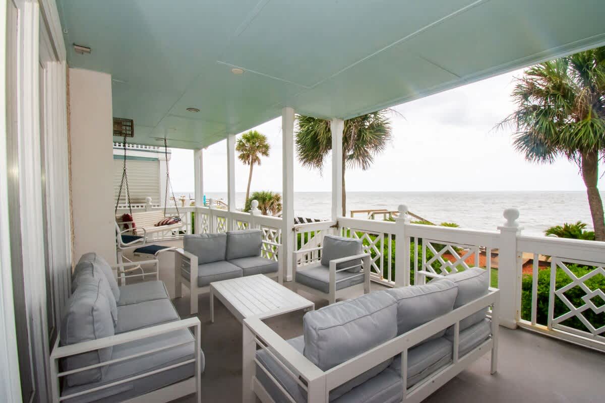 Ocean Front Balcony with Seating, Grill and Access to the Living Room/Kitchen Primary 1st Level Bedroom