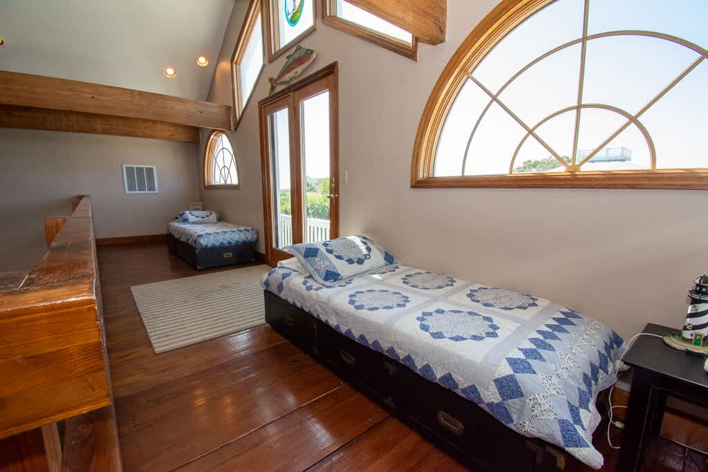 Loft with Twin Beds (Please Note This is not an Enclosed Area)