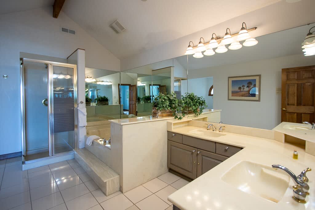 Second Primary En-Suite with a Soaking Tub, Walk-In Shower, and Double Vanity,