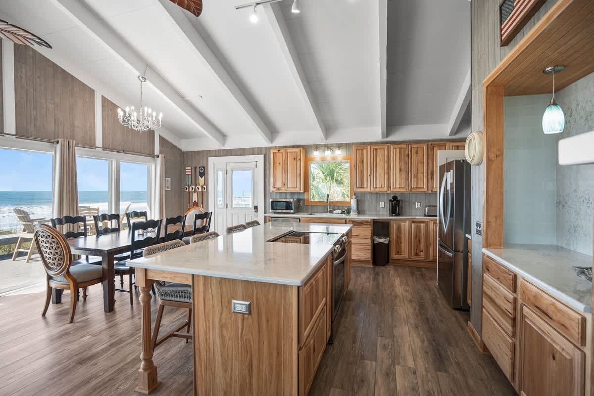 Kitchen with Island Bar and Dining Area