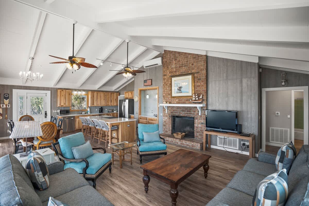 Living Room, Kitchen, Dining Area Open Concept. Fireplace is for Guest Use (Firewood not provided)