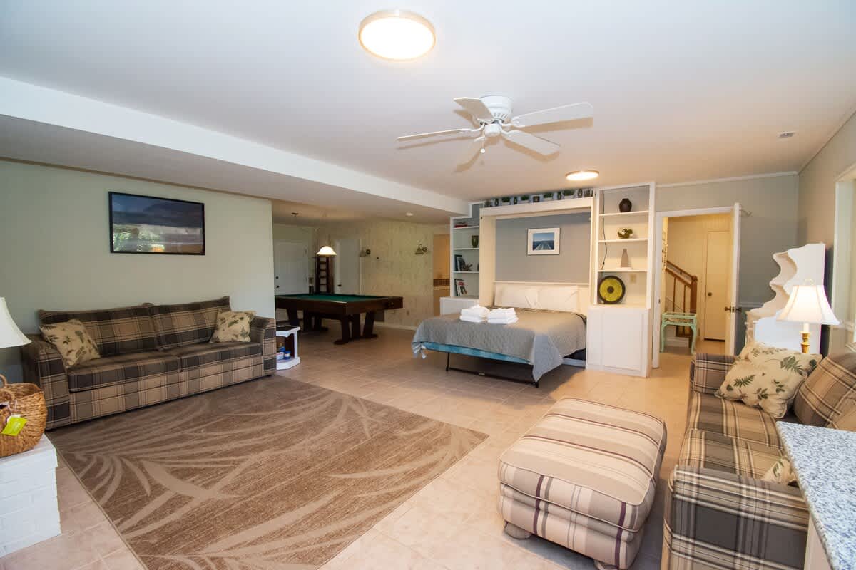 Downstairs Queen Murphy bed (stays open), 2 Queen Sleeper Sofas, Pool Table