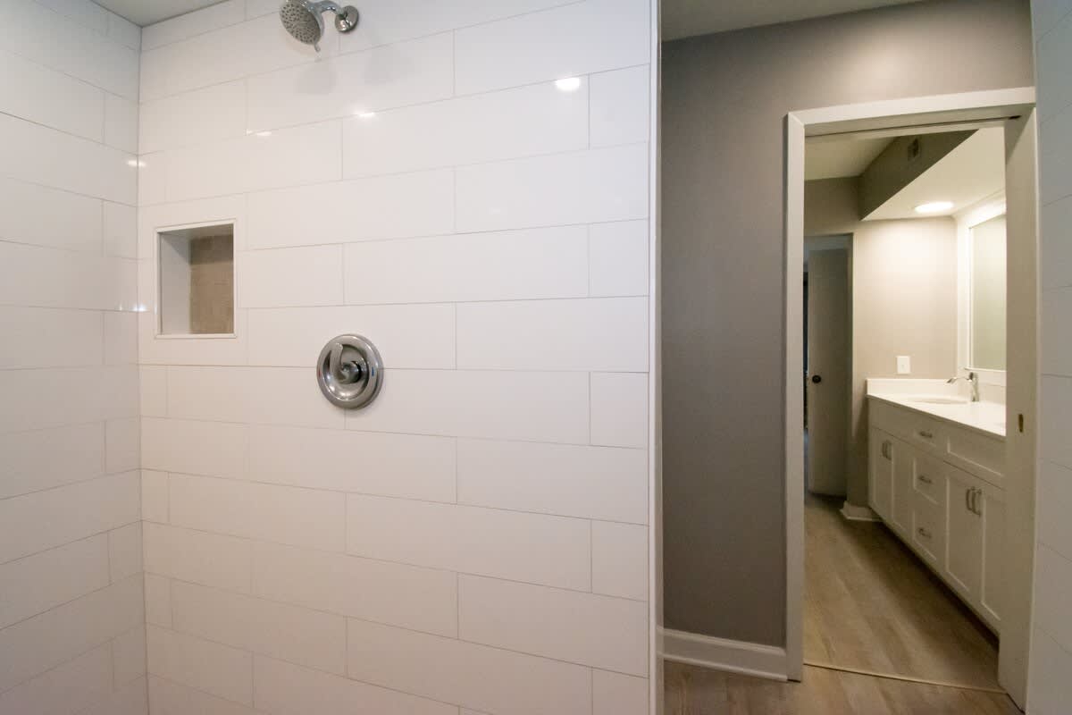 First floor primary bedroom with en suite bathroom